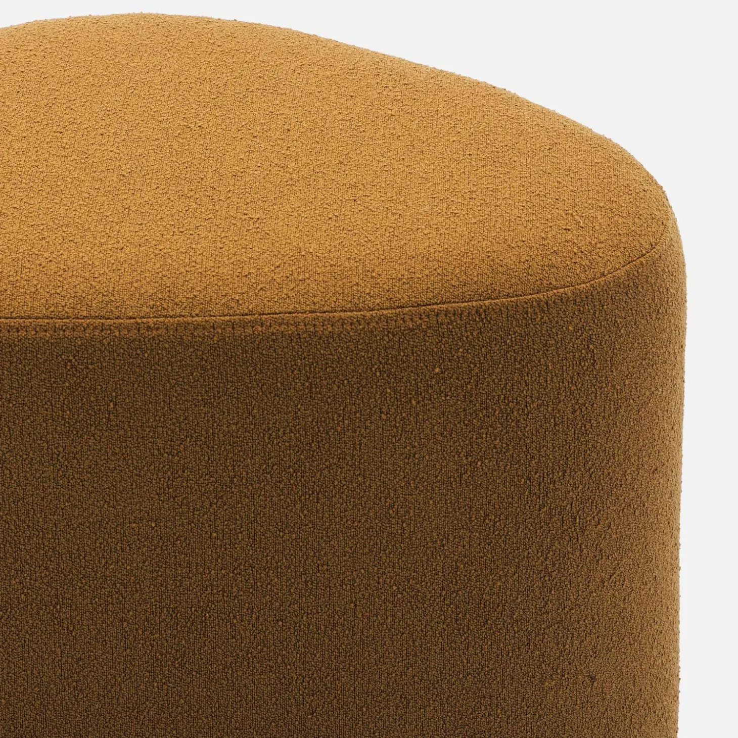 Hocker in Kieselsteinform mit Stoffbezug
