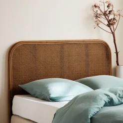 Kopfteil aus dunklem Rattan und Rattan-Geflecht
