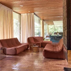 Modulares Ecksofa für 7 Personen mit strukturiertem Bouclé-Bezug und Hocker