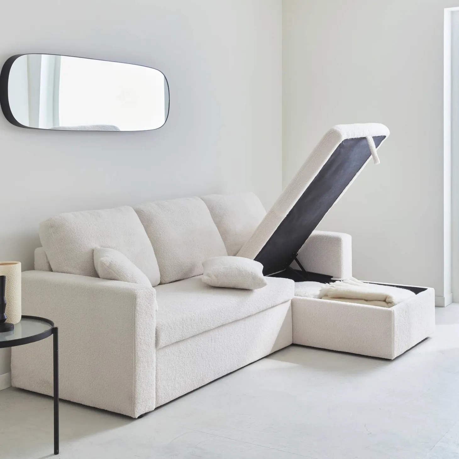 3-Sitzer Schlafsofa mit beidseitig montierbarer Recamiere und Bouclé-Bezug
