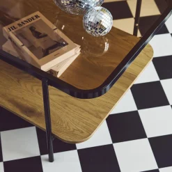 Vintage Couchtisch aus schwarzem Metall mit Glasplatte und Holzdekor